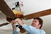 a Sunnyvale electrician is installing a ceiling fan